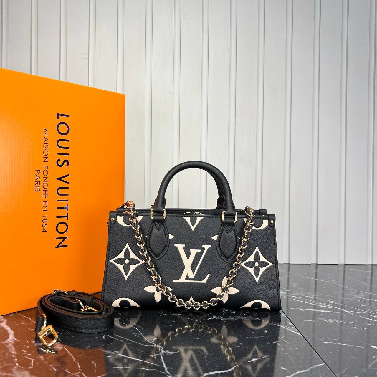 Louis V OnTheGo East West Genuine Leather