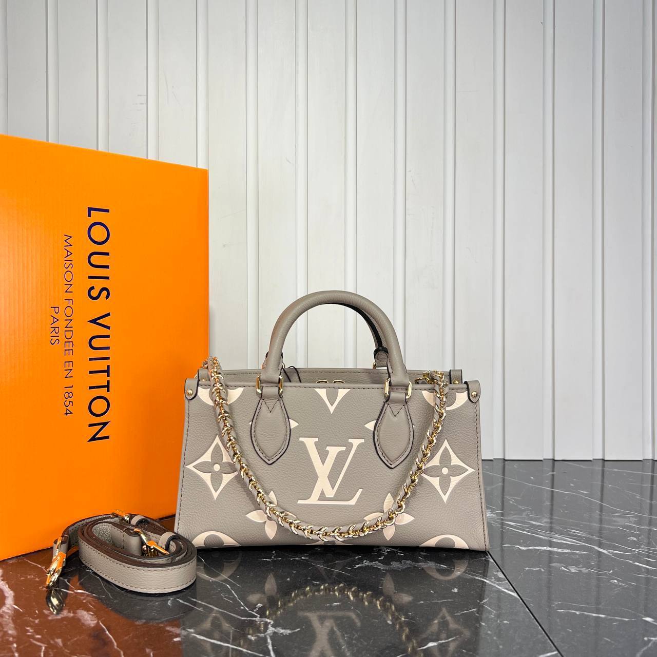 Louis V OnTheGo East West Genuine Leather